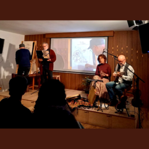 Concierto solidario Cuentos de Antiguamente en Madrid. En la imagen se ve a Javier Olivares, dibujando; Antonio Perla de Narrador; y a Pilar López Ballarín y José Climent cantando.
